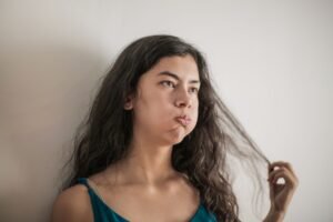teen rolling eyes